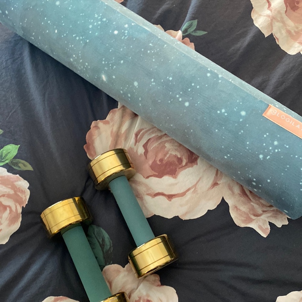dumbbell and yoga mat